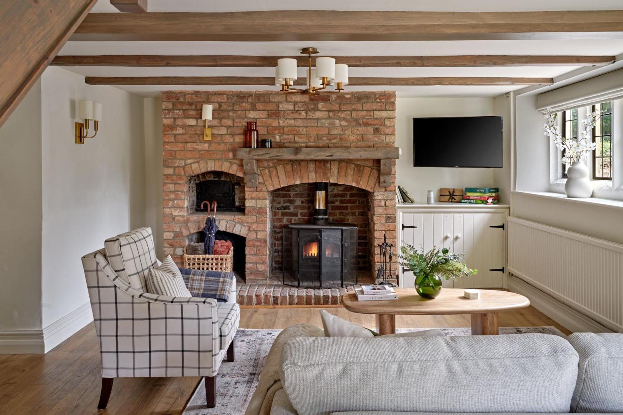 Hotel Ellenborough Park Bishop's Cleeve Esterno foto The interior of the cottage