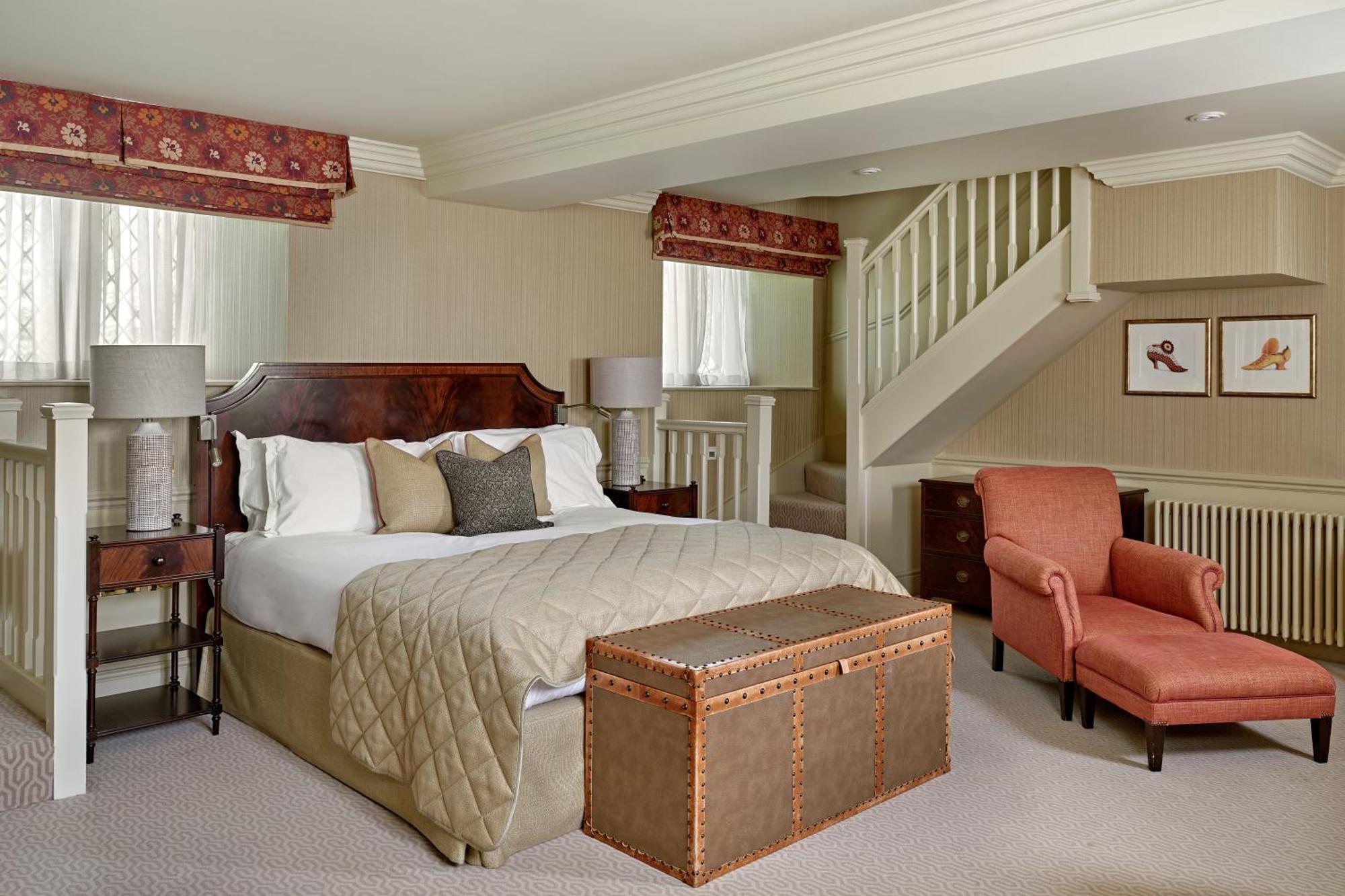 Hotel Ellenborough Park Bishop's Cleeve Camera foto A bedroom at The Swan